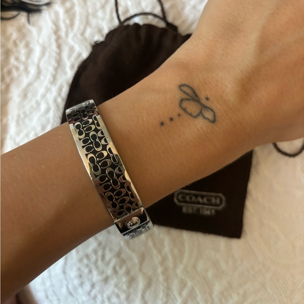 Silver and black vintage coach bangle